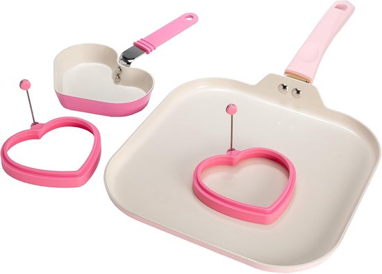 Roze hartvormige pan, twee roze hartvormige eierringen en een vierkante bakplaat met roze rand.