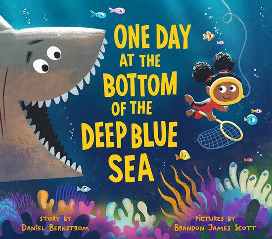 Boek 'One Day at the Bottom of the Deep Blue Sea' met een cartoon haai en een meisje dat naar visjes vist onder de zee.