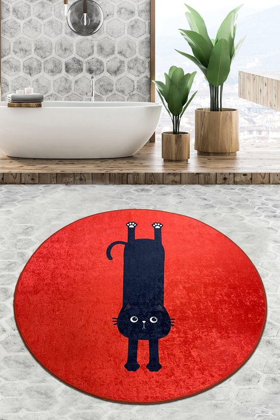 Rode ronde badmat met een zwart katje dat ondersteboven hangt.