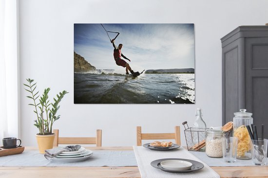 Un homme wakeboard sur toile d'eau de mer calme 120x80 cm - Tirage photo sur toile (Décoration murale salon / chambre)