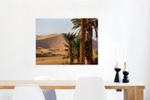 Canvas Schilderij Marokkaanse palmbomen en duinen in Merzouga bij Erg Chebbi - 80x60 cm - Wanddecoratie