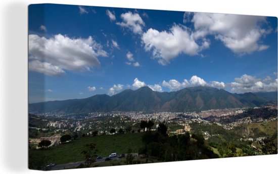Canvas Schilderij Uitzicht over Caracas aan de rivier Guaire in Venezuela - 40x20 cm - Wanddecoratie