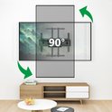 Support mural TV avec bras pivotant capable de faire pivoter une télévision de 90°, dans un salon.