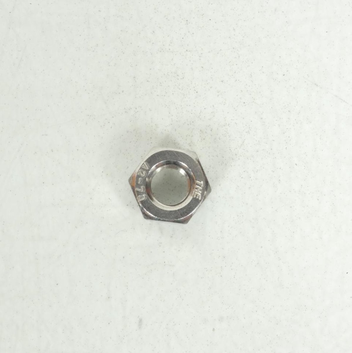 Moer m10 p1,50 1251300-050000 voor motoren 310 x 2018 tot 2024 nieuw