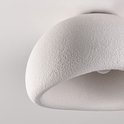 Close-up van de textuur van de witte lampenkap.
