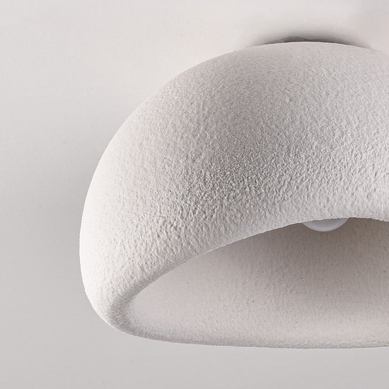 Close-up van de textuur van de witte lampenkap.