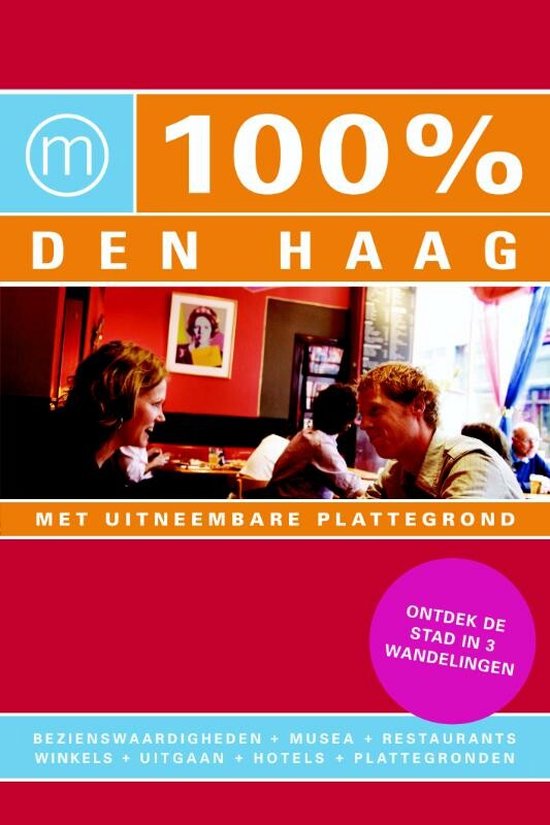 100% Den Haag: twee vrouwen praten aan tafel in een restaurant, achtergrond met schilderij.