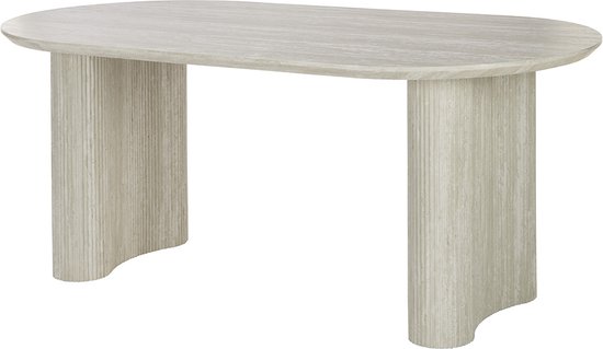 Een ovale, lichtgrijze eettafel met gecanneleerde poten, gezien vanuit een hoek.