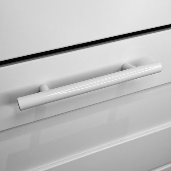 Witte T-greep op een witte lade.
