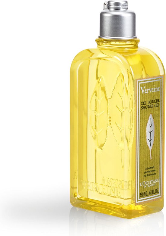 Vierkante, doorzichtige fles met gele douchegel. Zilveren dop. Groen en beige label met bladprint.