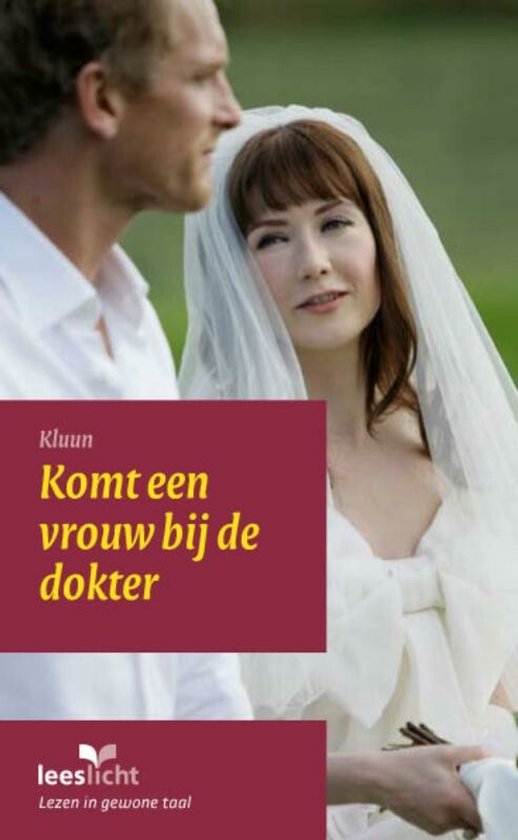 Een bruid met sluier en een man in wit shirt.