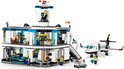 LEGO City Luchthaven met Vliegtuig (60502) set, wit gebouw met blauwe raamkozijnen en een vliegtuig.