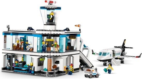 LEGO City Luchthaven met Vliegtuig (60502) set, wit gebouw met blauwe raamkozijnen en een vliegtuig.