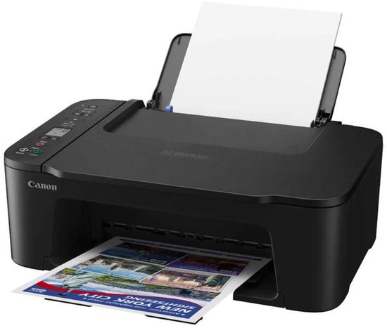 Zwarte Canon Pixma printer met papier in de in- en uitvoerlade, met een brochure over New York City.