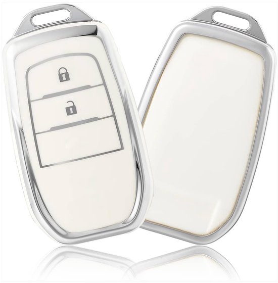 Twee witte autosleutel hoesjes met zilveren rand. Eén met drie knoppen, de ander leeg.