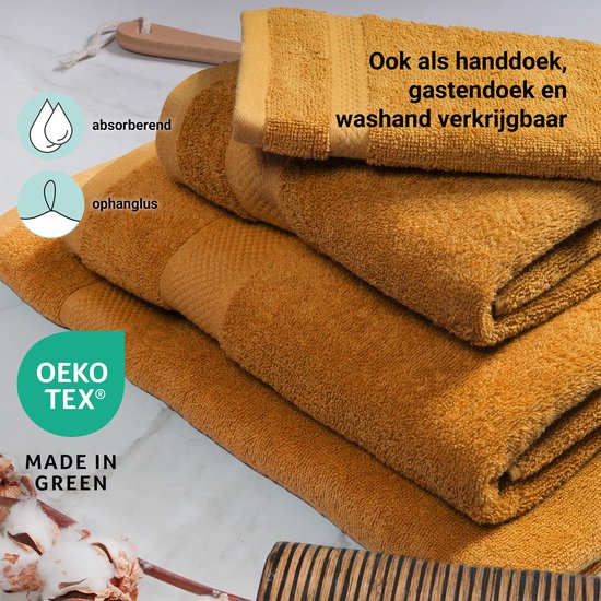 Pile de serviettes ocre, avec des icônes absorbantes et une boucle de suspension.