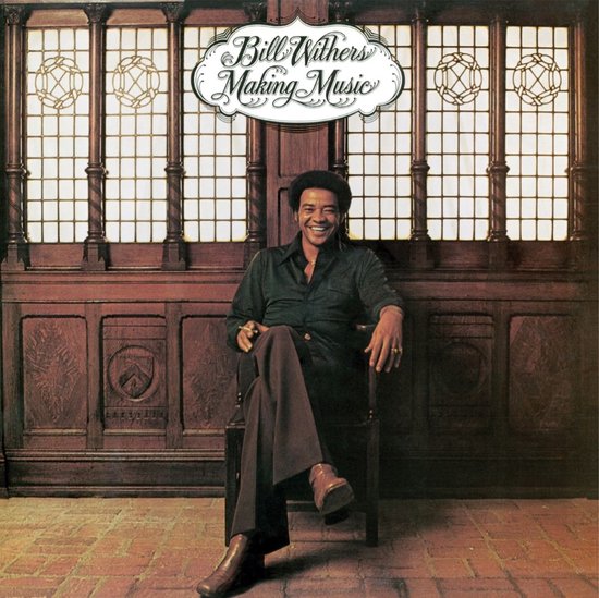 Bill Withers zittend in een stoel voor een houten achterwand met ramen. De titel "Bill Withers Making Music" staat bovenaan.