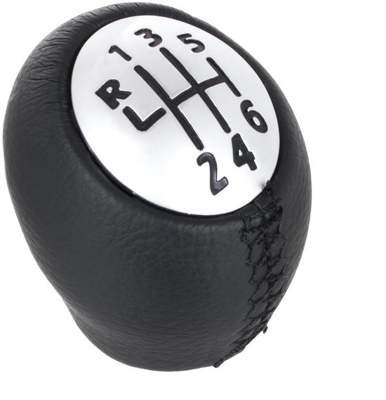 Zwarte pookknop met zilverkleurige bovenkant, met versnellingsindicator (R, 1, 2, 3, 4, 5, 6).