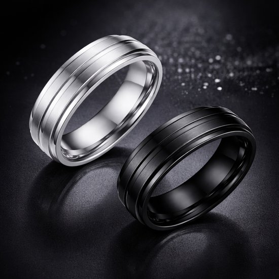 Twee ringen, een zilverkleurige en een zwarte, met een geborstelde afwerking en twee gepolijste groeven.