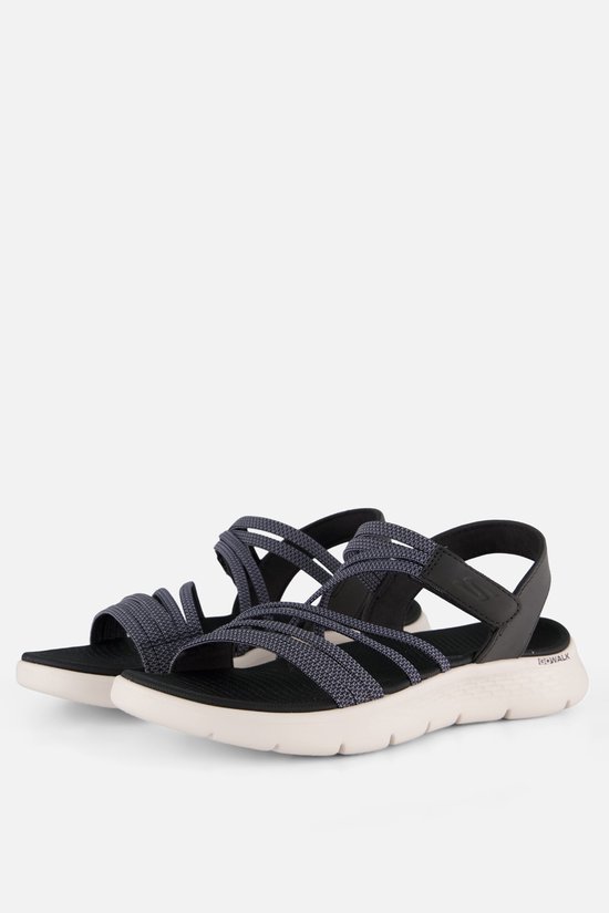 Deux sandales Skechers bleues avec brides croisées et semelles blanches.
