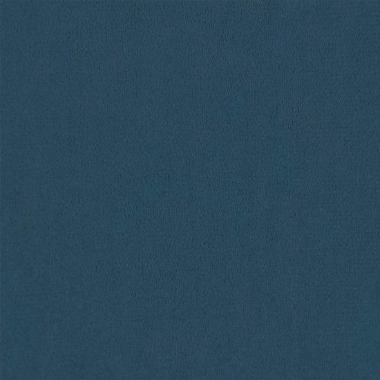 Gros plan sur la texture du velours bleu.