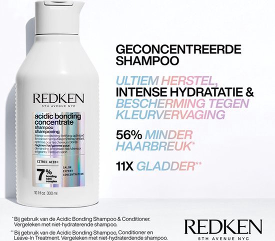 Flacon de shampoing Redken avec le texte 'Shampoing concentré' et 'Restauration ultime, hydratation intense et protection contre la décoloration'.