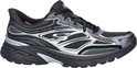 Zwarte Skechers sneaker met zilverkleurige details en 'Slip-ins' logo.