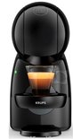 Zwarte Krups Dolce Gusto Piccolo XS koffiemachine met een glas espresso.