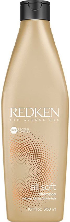 Bouteille de shampooing Redken All Soft dorée claire avec bouchon blanc. L'étiquette présente un motif circulaire.