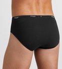 Zwarte Sloggi slip op model, achterkant, met witte tailleband met logo.