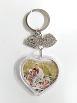 Sleutelhanger hanger met bedel tas en hart. Hart transparant voor foto