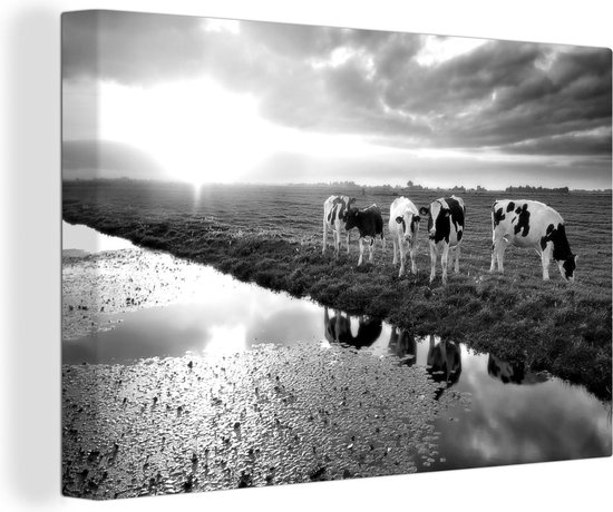 Canvas Schilderij Koeien tijdens een zonsondergang - zwart wit - Wanddecoratie