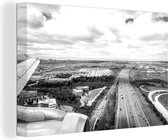 Canvas Schilderij Zonnige luchtfoto van Amsterdam - zwart wit - 30x20 cm - Wanddecoratie