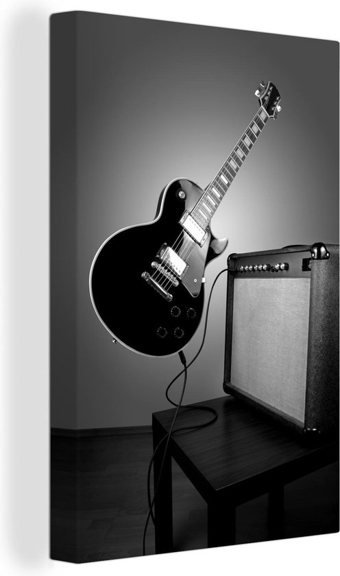 Canvas Schilderij Een zwevende elektrische gitaar - zwart wit - 60x90 cm - Wanddecoratie
