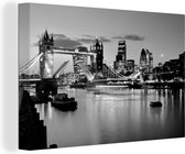 Canvas schilderij 140x90 cm - Wanddecoratie Een geopende Tower Bridge in Londen - zwart wit - Muurdecoratie woonkamer - Slaapkamer decoratie - Kamer accessoires - Schilderijen