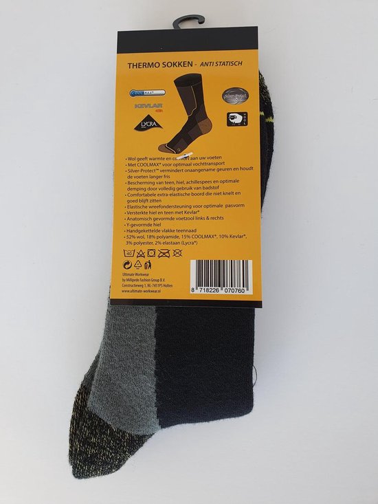 Verpakking van zwarte Thermo sokken met grijze en gele accenten. "THERMO SOKKEN - ANTI STATISCH" en "KEVLAR".