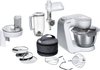 Wit en zilverkleurig Bosch MUM5 keukenmachine met accessoires: blender, vleesmolen, kom, garde.