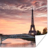 Poster Een mooie oranje lucht boven de Eiffeltoren in Parijs - 100x100 cm XXL