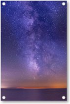 Adembenemende foto van de zee onder een donker paarse sterrenhemel - Tuinposter 60x90 - Wanddecoratie - Besteposter - Sterren