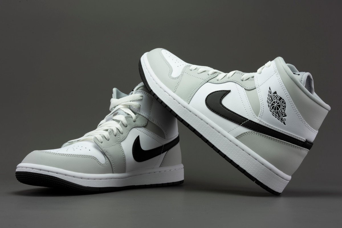 black and white mid jordan 1 womens