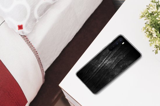 Telefoonhoesje met zwarte metaalprint, met glitter details, in een transparante siliconen rand.