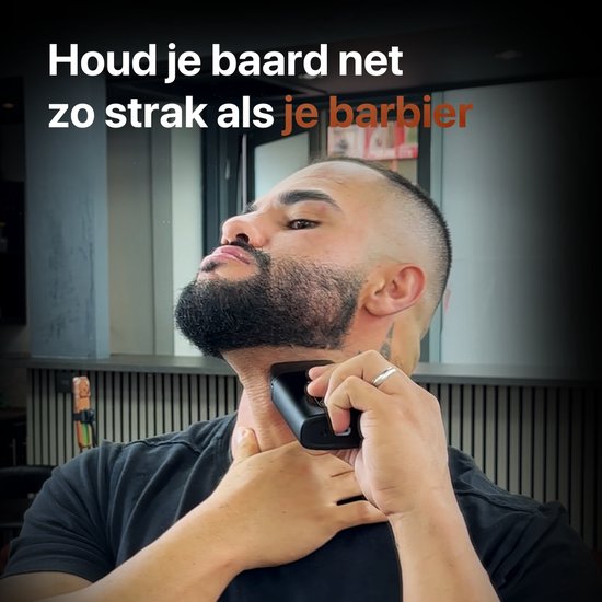 Man met baard trimt zijn nek met zwart scheerapparaat met Viking-logo.