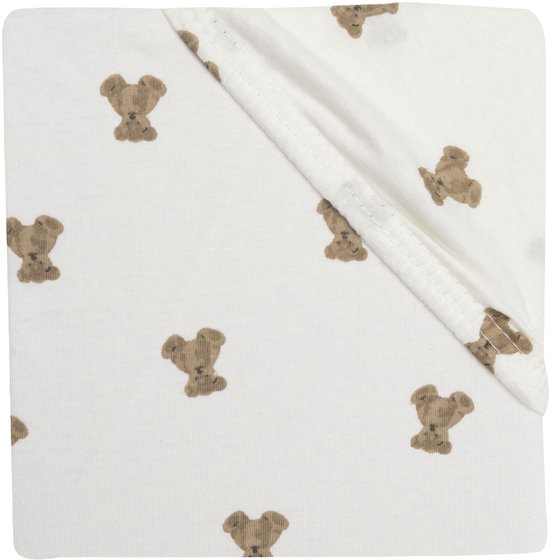 Gevouwen wit hoeslaken met een patroon van bruine teddyberen.