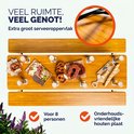 Biertafel met diverse hapjes en drankjes, ideaal voor 8 personen. Houten blad.