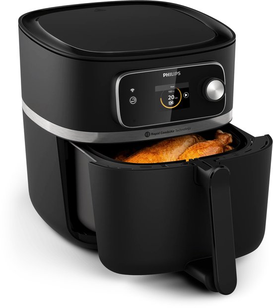 Zwarte Philips Airfryer XXL met een goudbruine kip in de lade. Het display toont 160 graden en 20 minuten.
