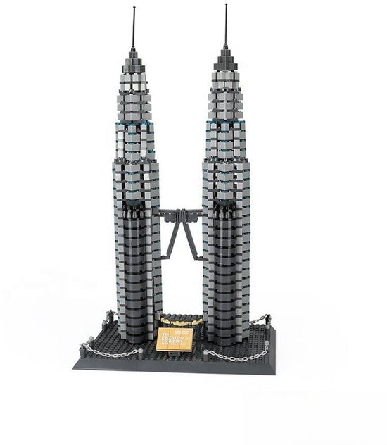 Model van de Petronas Twin Towers in grijs en blauw, met een gouden plaquette op een zwarte basis.