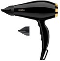 Zwarte BaByliss föhn met gouden accenten en twee opzetstukken. BaByliss PARIS logo zichtbaar.
