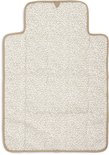 Lichtbruine luierwisselmat met beige stippenpatroon en beige randafwerking.