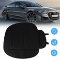Zwarte autostoelhoes met gestreepte vulling, getoond met een grijze Audi A7.