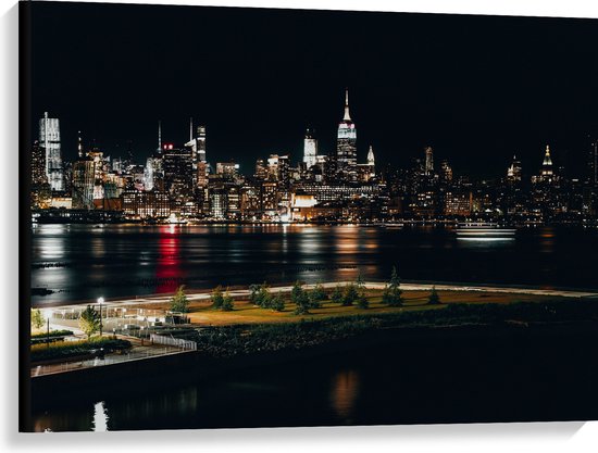 Canvas - Skyline in New York in de Nacht - 100x75 cm Foto op Canvas Schilderij (Wanddecoratie op Canvas)